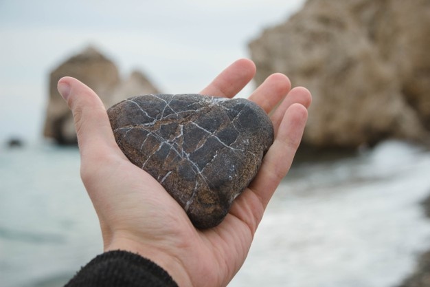 holding a rock